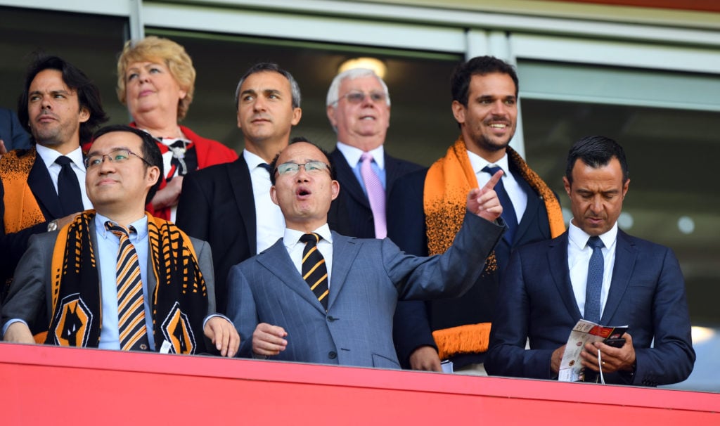 The new Chinese owners, Jeff Shi of Fosun International Limited and Wolverhampton Wanderers, Guo Guangchang the chairman of Fosun International Limited owner of Wolverhampton Wanderers and Jorge Mendes Sports Agent during the Sky Bet Championship match between Rotherham United v Wolverhampton Wanderers at The New York Stadium on August 6, 2016 in Rotherham, England.
