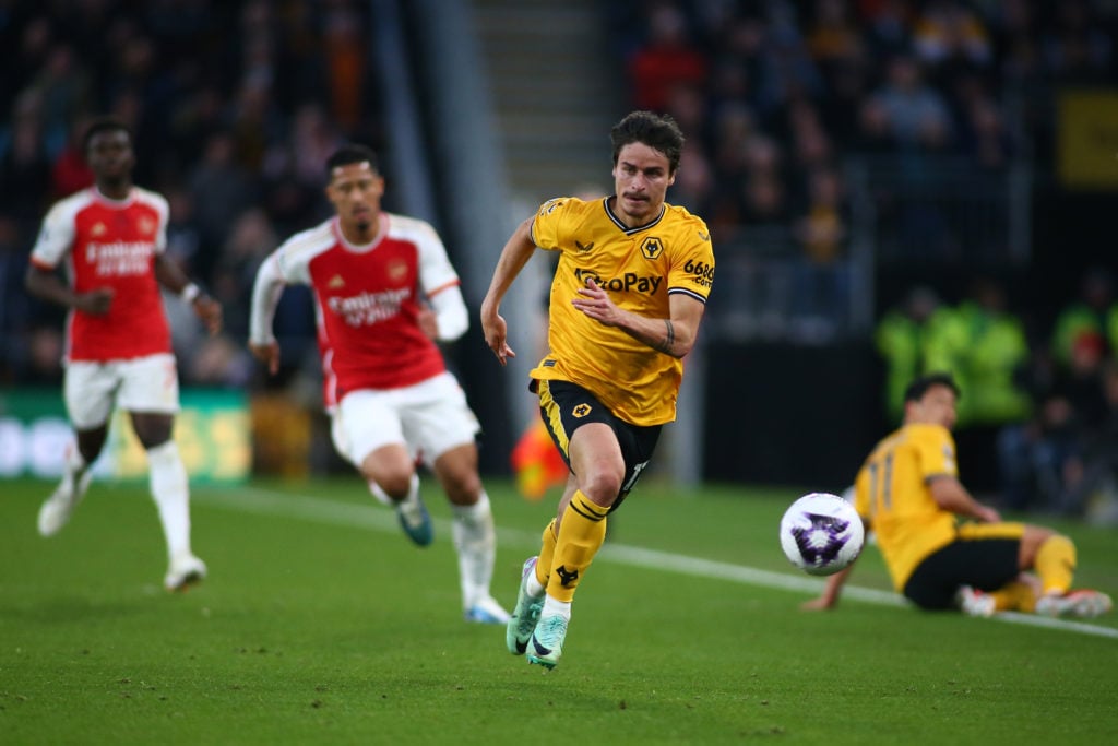 Hugo Bueno playing for Wolves against Arsenal.