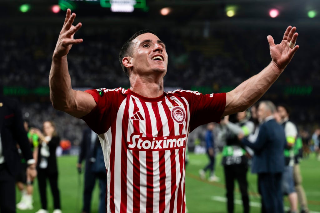 Daniel Podence of Olympiacos FC celebrates the victory at