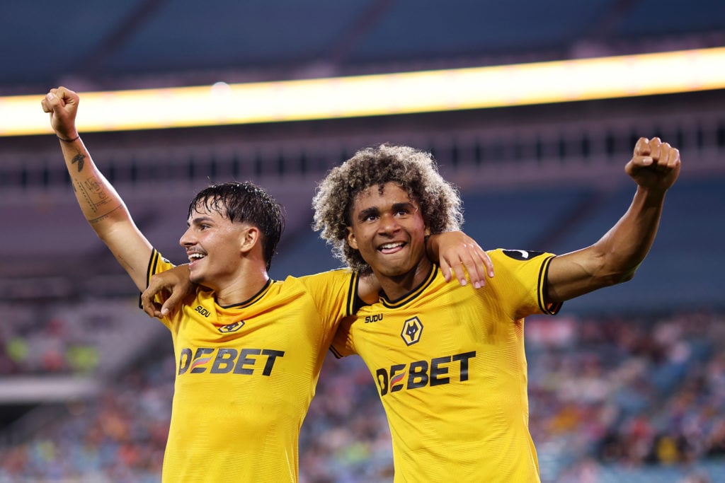 Rodrigo Gomes of Wolverhampton Wanderers (L) celebrates after scoring his team's third goal with Pedro Lima during the Stateside Cup pre-season match between West Ham United and Wolverhampton Wanderers at EverBank Stadium on July 27, 2024