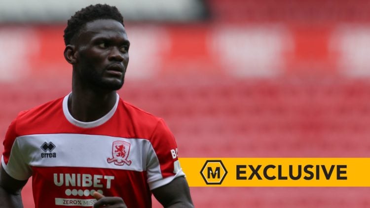 Middlesbrough's Emmanuel Latte Lath is playing during the Pre-season Friendly match. Overlaid, an exclusive banner.