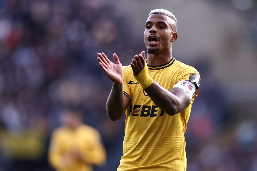 Mario Lemina of Wolverhampton Wanderers wears the 'Play Safe' captains armband during the Premier League match between Wolverhampton Wanderers FC a...