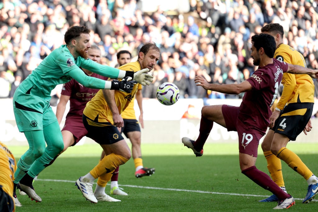 Wolverhampton Wanderers' Portuguese goalkeeper #01 Jose Sa vies for the ball with Manchester City's German midfielder #19 Ilkay Gundogan during the English Premier League football match