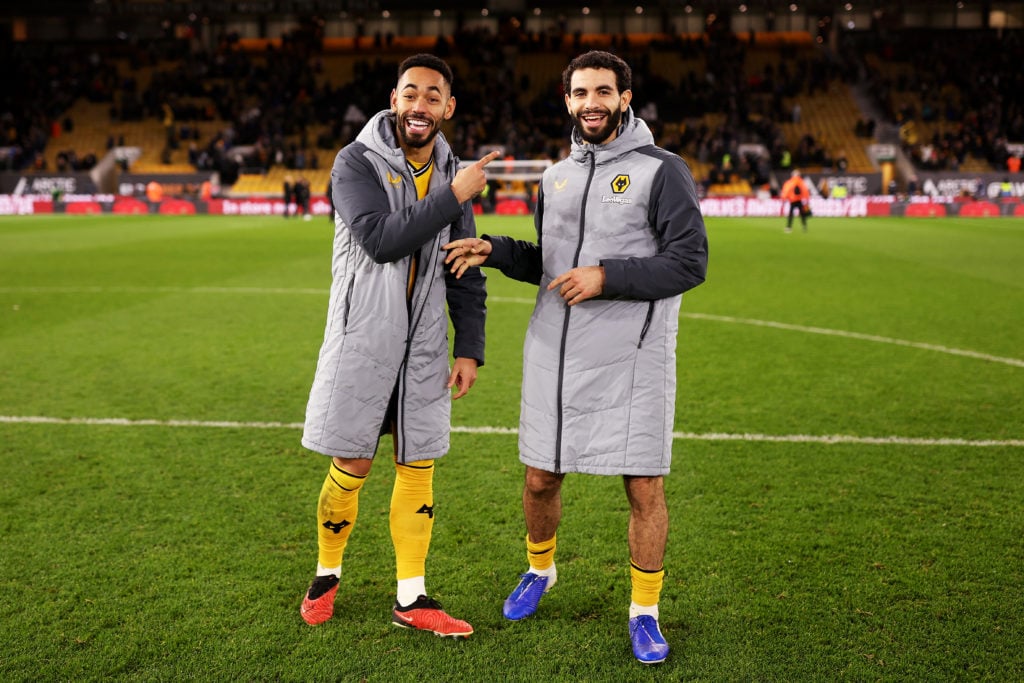 Matheus Cunha (L) and Rayan Ait-Nouri of Wolverhampton Wanderers celebrate following victory in the Premier League match between Wolverhampton Wanderers and Everton FC at Molineux