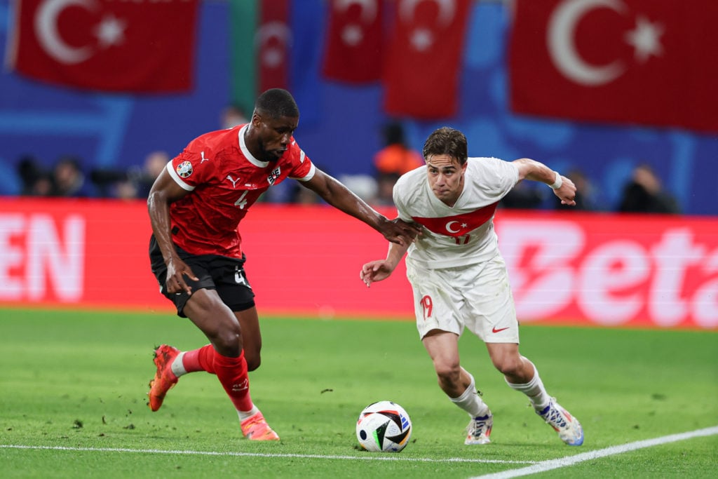 Kevin Danso of Austria (L) and Kenan Yildiz of Turkiye (R)