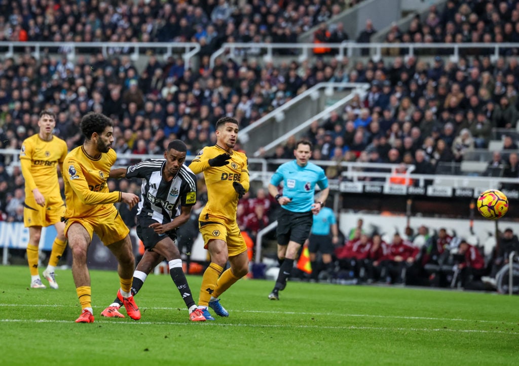 Newcastle United's Alexander Isak scores the opening goal during the Premier League match between Newcastle United and Wolverhampton Wanderers
