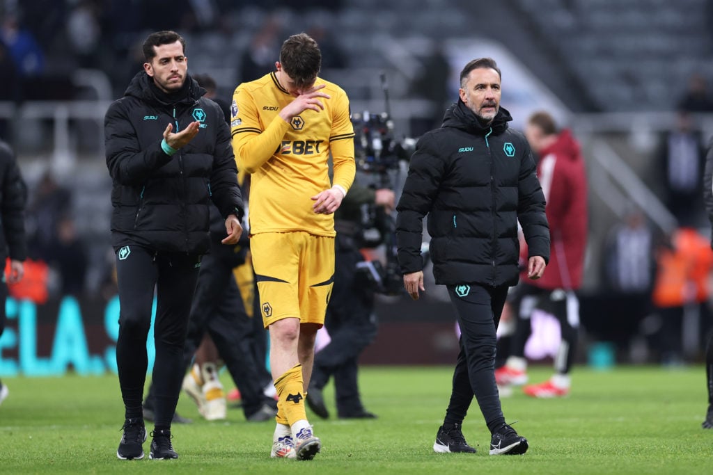 Vitor Pereira the manager of Wolverhampton Wanderers and Jorgen Strand Larsen look dejected after the Premier League match between Newcastle United FC and Wolverhampton Wanderers FC