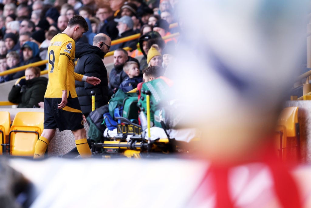 Jorgen Strand Larsen of Wolverhampton Wanderers reacts after leaving the pitch with an injury during the Premier League match between Wolverhampton Wanderers FC and Arsenal FC at Molineux