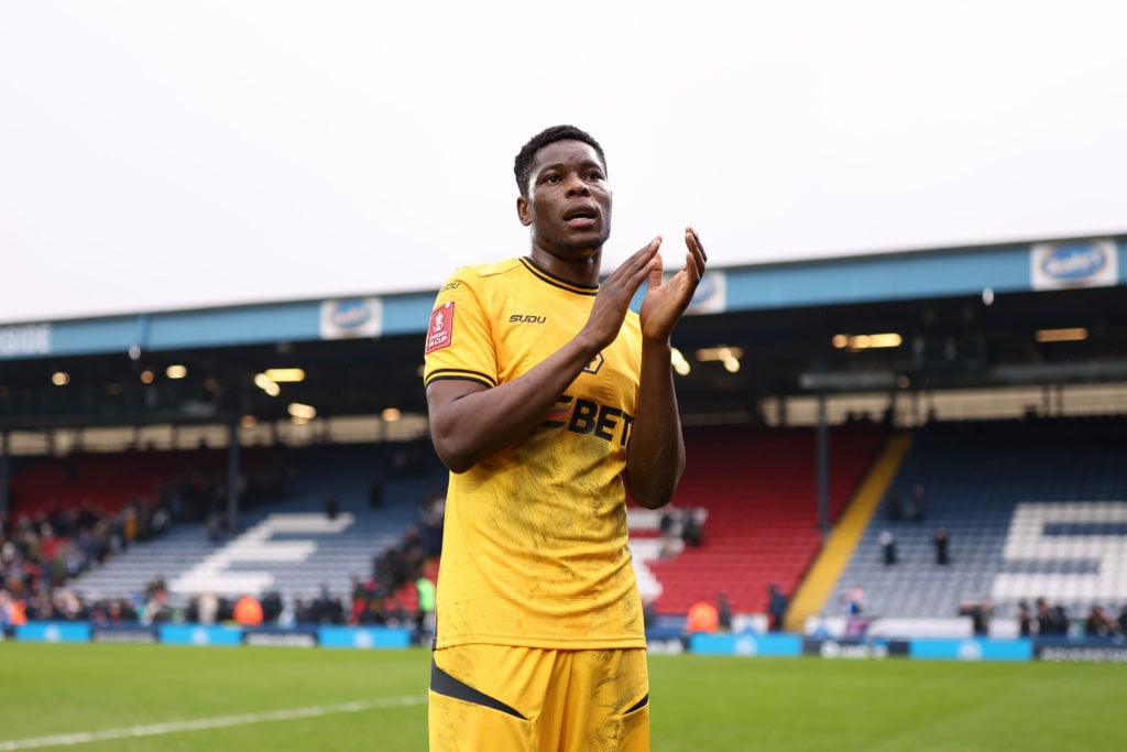 Wolves midfielder Marshall Munetsi applauds.