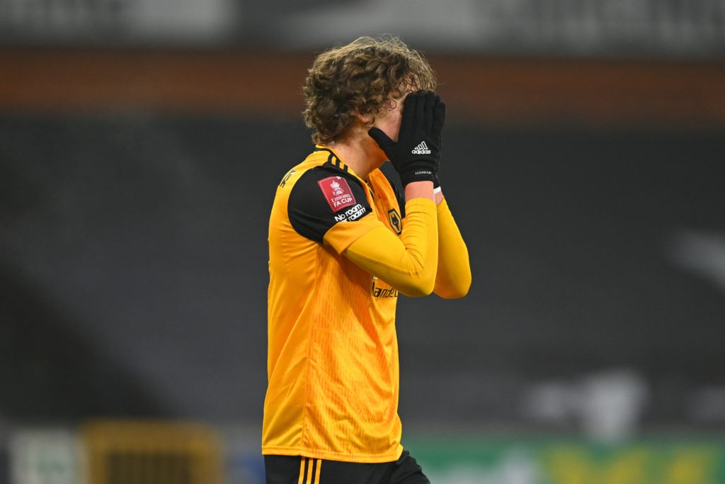 Fabio Silva covers his eyes during Wolves' FA Cup game against Crystal Palace.