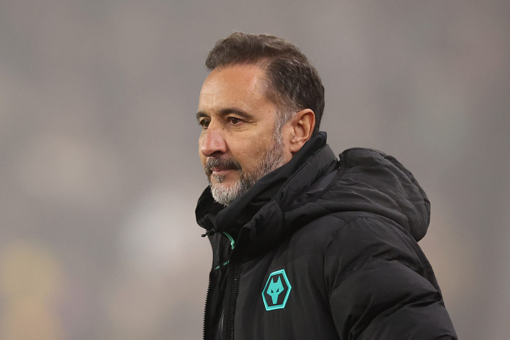 Wolves manager Vitor Pereira watches on.