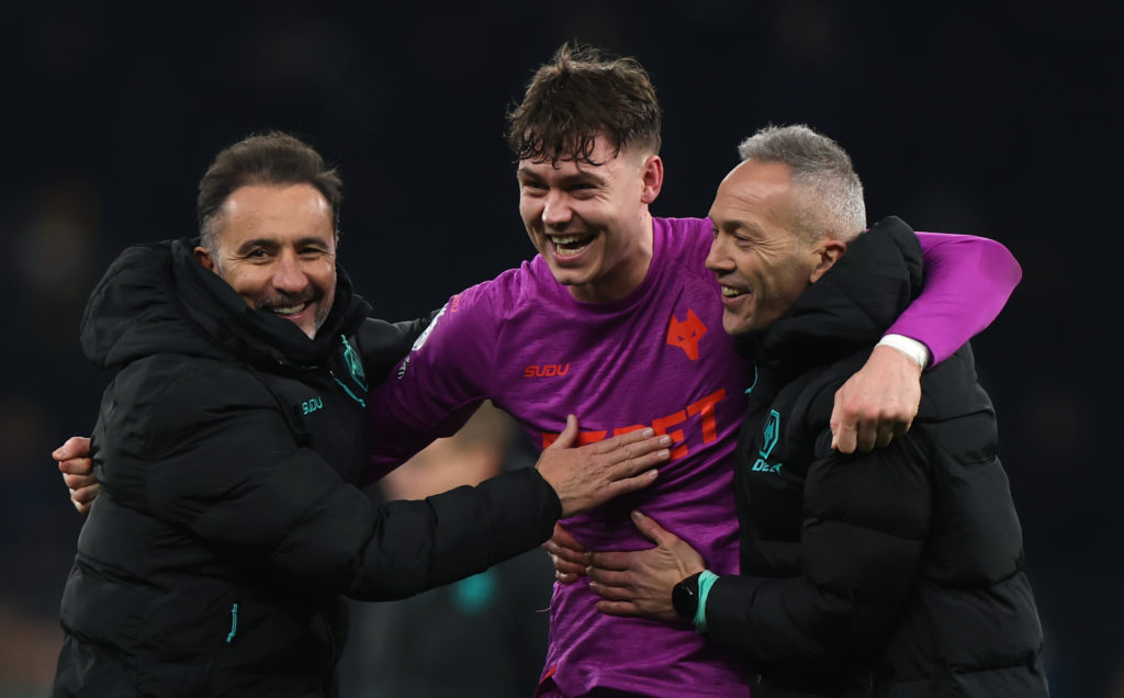Vitor Pereira, Manager of Wolverhampton Wanderers, and Andre Monteiro, Assistant Manager of Wolverhampton Wanderers, embrace Joergen Strand Larsen of Wolverhampton Wanderers after the draw in the Premier League