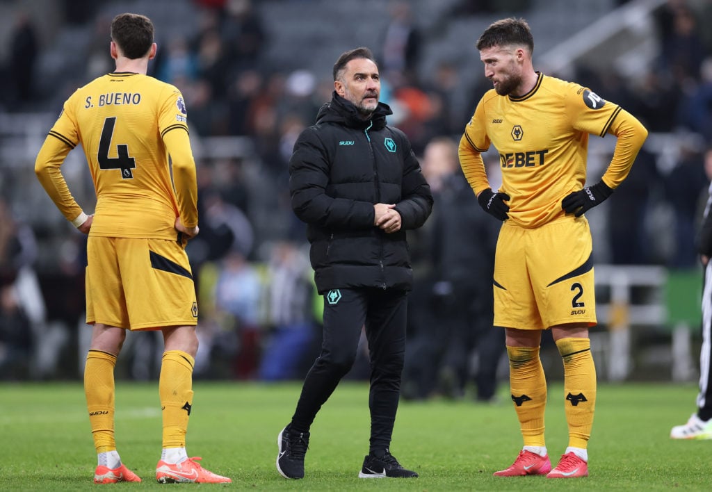 Vitor Pereira the manager of Wolves and Matt Doherty look dejected after the Premier League match between Newcastle United FC and Wolverhampton Wanderers FC at St James' Park