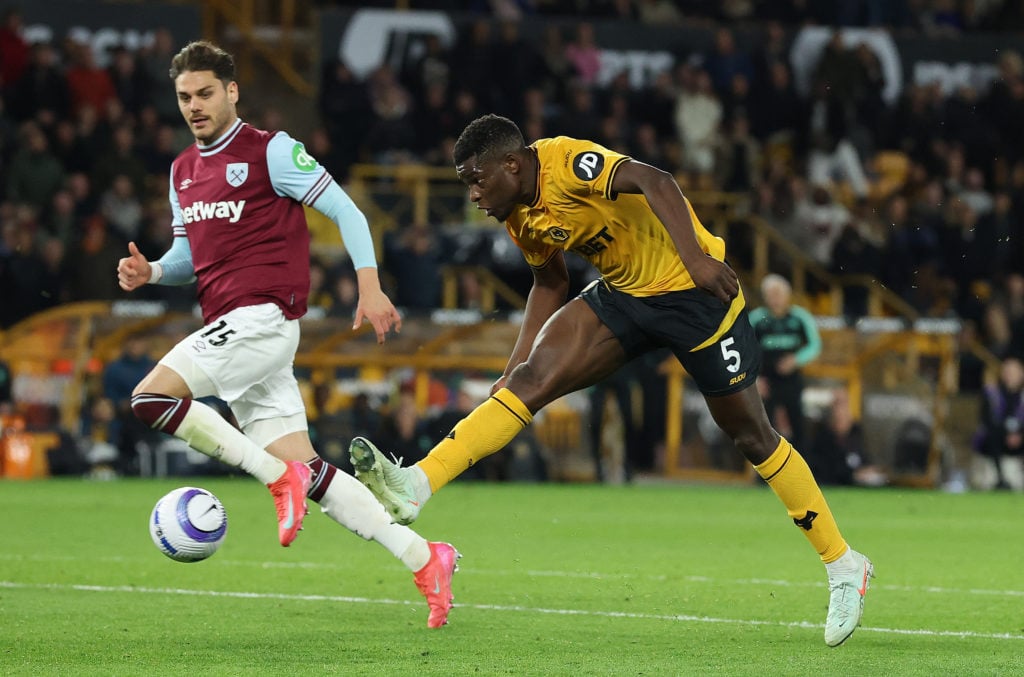 Marshall Munetsi of Wolverhampton Wanderers takes a shot at the West Ham goal during the Premier League match between Wolverhampton Wanderers FC and West Ham United FC at Molineux