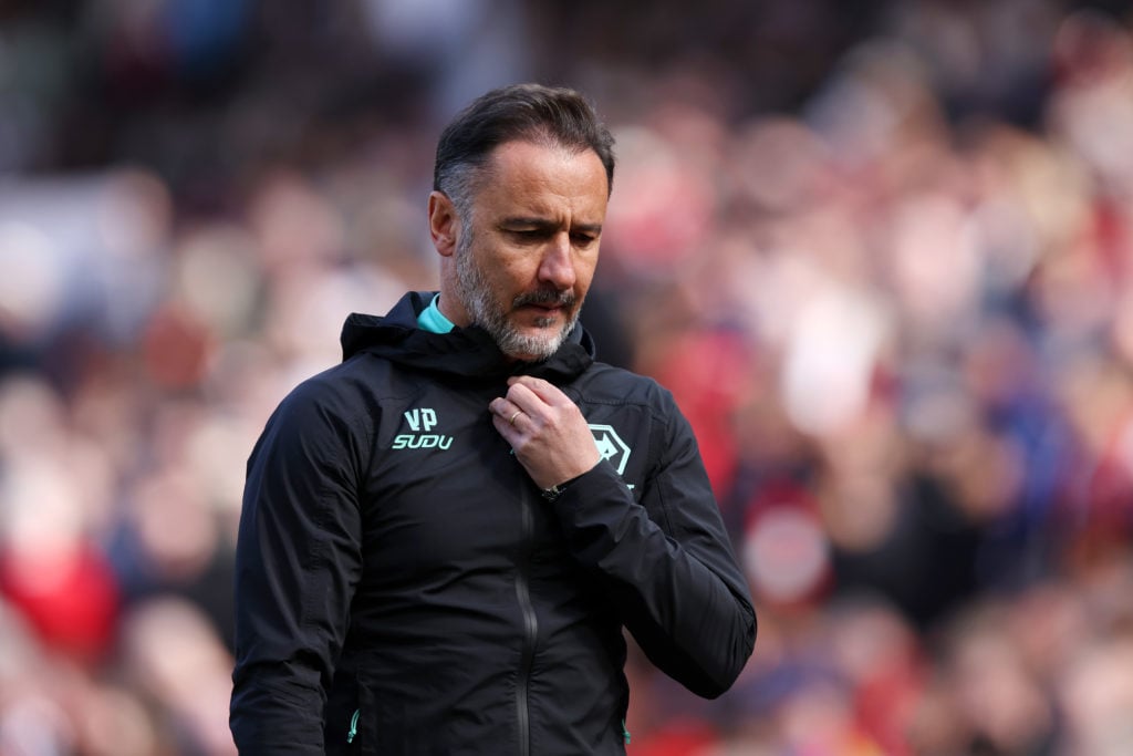Wolves manager Vitor Pereira looks down.