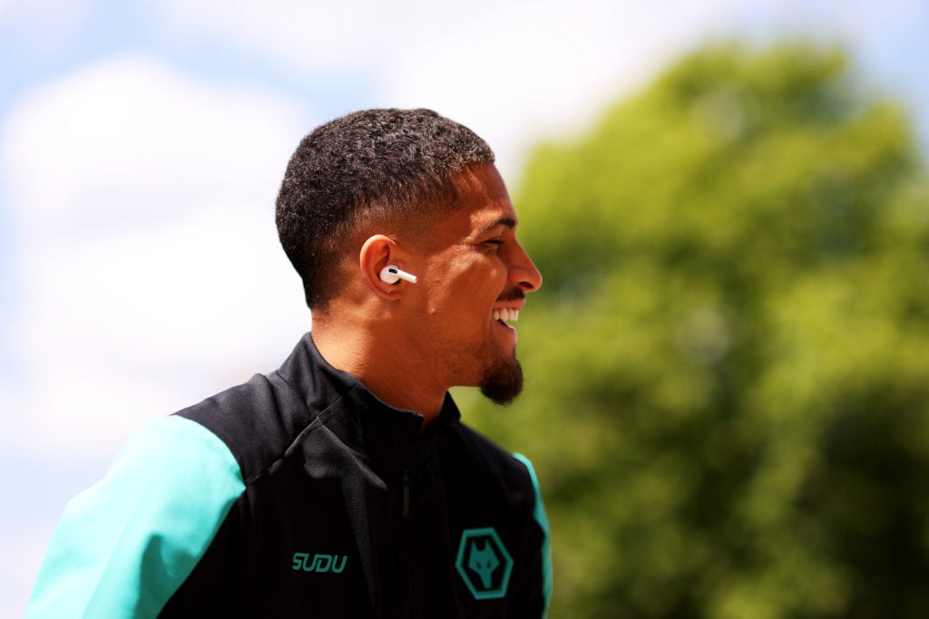 Joao Gomes laughs in Wolves training at Compton Park
