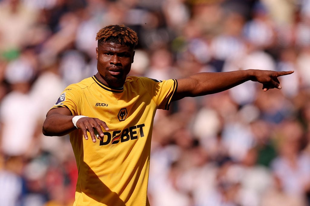 Emmanuel Agbadou points for Wolves.