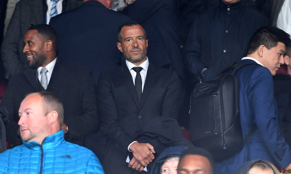 Agent Jorge Mendes sitting in a crowd.