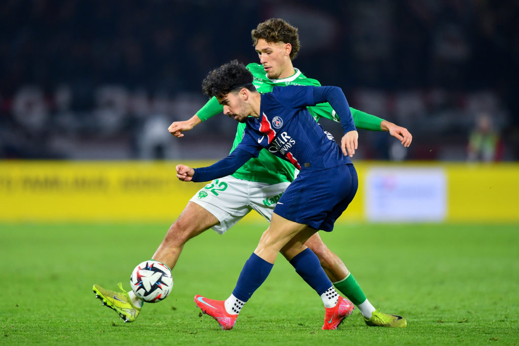 Saint-Etienne striker Lucas Stassin battle for the ball with Vitinha.
