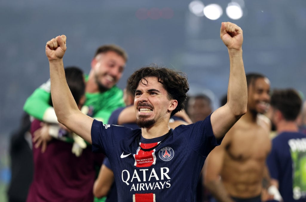 Vitinha of Paris Saint-Germain celebrates after their teams UEFA Champions League final record breaking victory following the UEFA Champions League Final 2025
