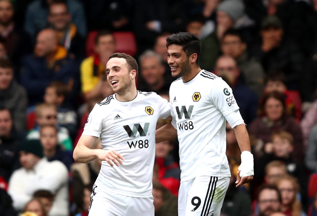 Diogo Jota celebrates with Raul Jimenez.