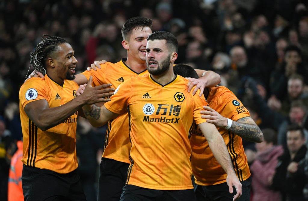 Patrick Cutrone celebrates after scoring for Wolves.