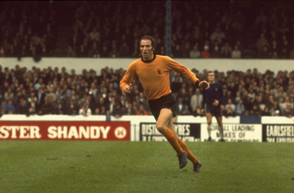 Derek Dougan of Wolves running up the pitch during a league match.