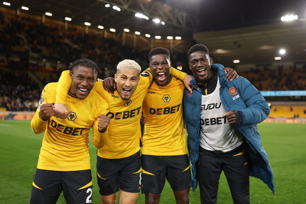 Nasser Djiga and his wolves teammates pose at Molineux.