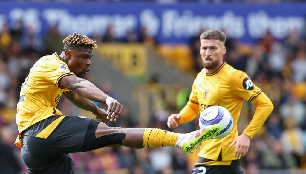 Emmanuel Agbadou clearing the ball for Wolves.