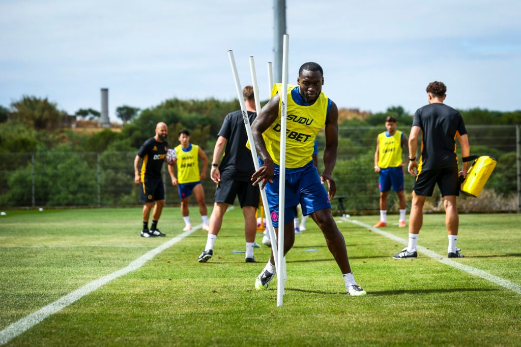 Toti Gomes weaves through poles in Wolves pre-season training.