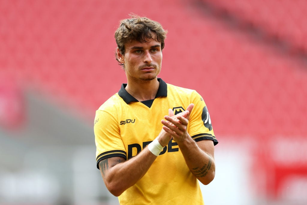 Hugo Bueno claps during Stoke City vs Wolves