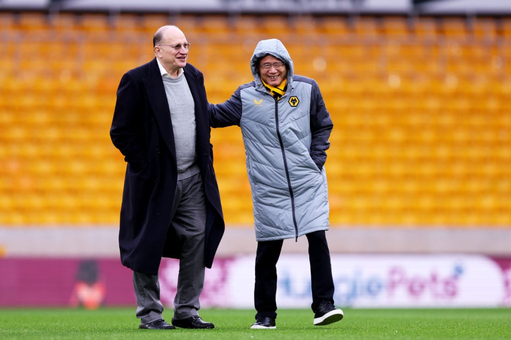 Mark Tucker, Chairman of the board of directors of HSBC (L) speaks with Guo Guangchang, chairman and co-founder of Fosun International Limited ahead of the Premier League match between Wolverhampton Wanderers and Chelsea FC at Molineux
