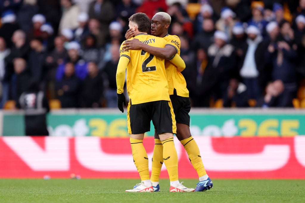 Matt Doherty and Toti Gomes celebrating a goal after scoring against Chelsea in the Premier League