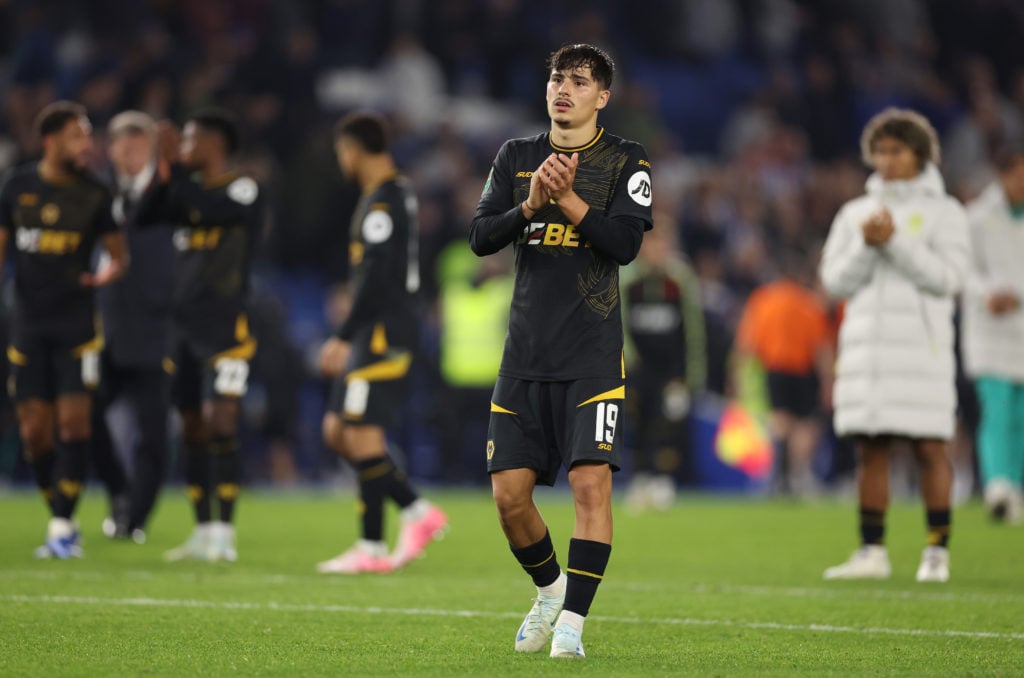 Rodrigo Gomes of Wolverhampton Wanderers applauds the fans after the team's defeat in the Carabao Cup Third Round match between Brighton & Hove Albion and Wolverhampton Wanderers