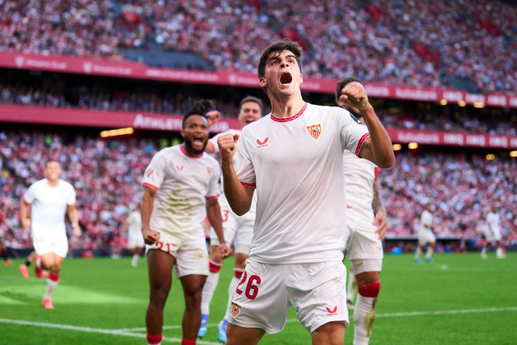 Juanlu Sanchez celebrates after scoring for Sevilla.