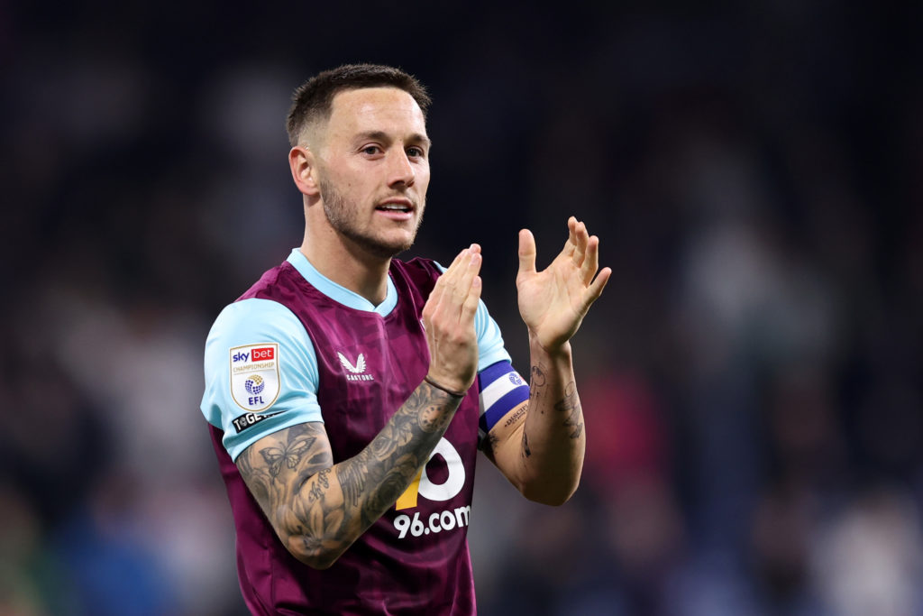 Josh Brownhill claps fans after playing for Burnley.