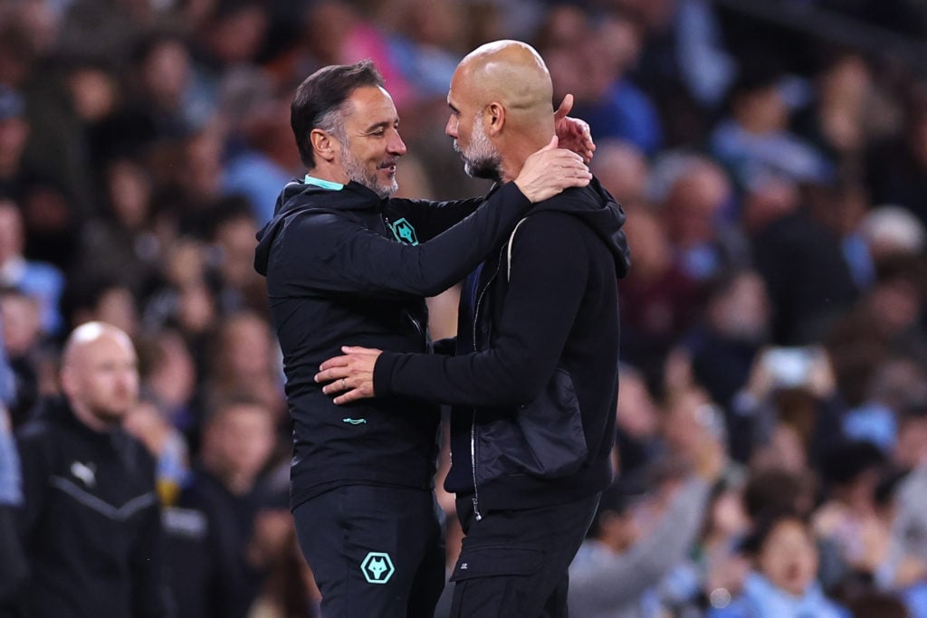 Wolves manager Vitor Periera hugging Pep Guardiola at full-time of Premier League game at the Etihad in 2024/2025