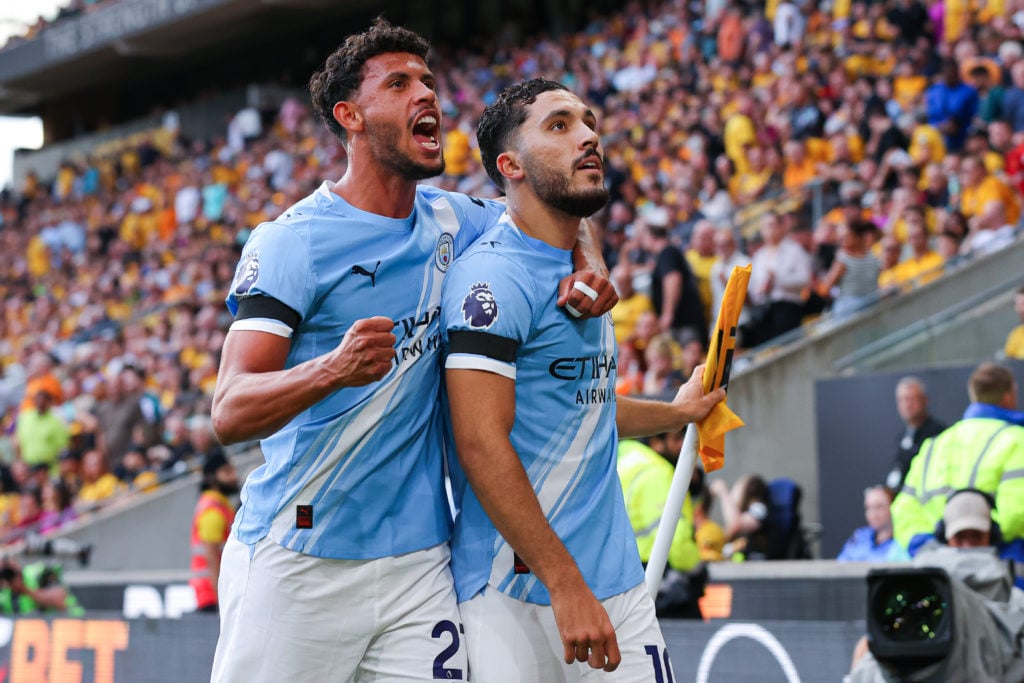 Matheus Nunes celebrating goal with Rayan Cherki during Man City's 4-0 win at Molineux against Wolves