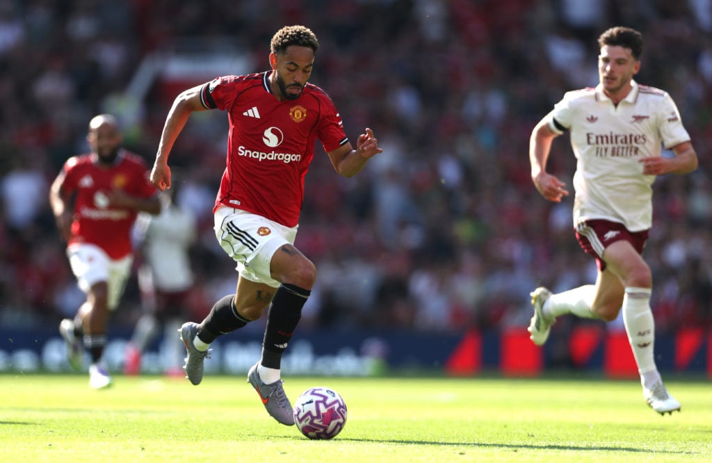Matheus Cunha of Manchester United in action during the Premier League match between Manchester United and Arsenal at Old Trafford on August 17, 2025 in Manchester, England.