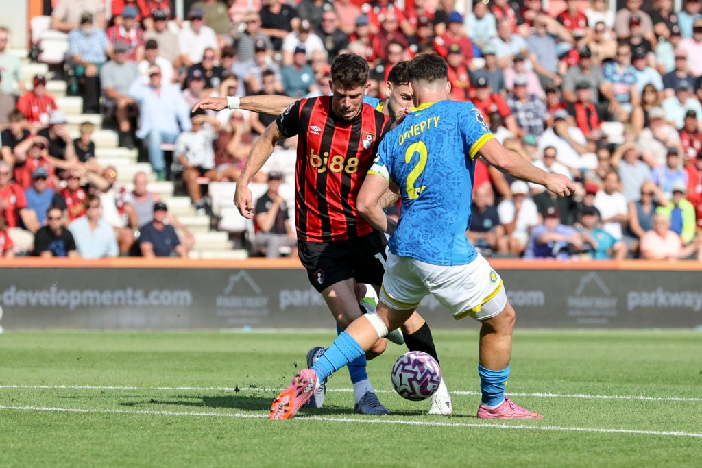 Matt Doherty in action against Bournemouth's Ryan Christie