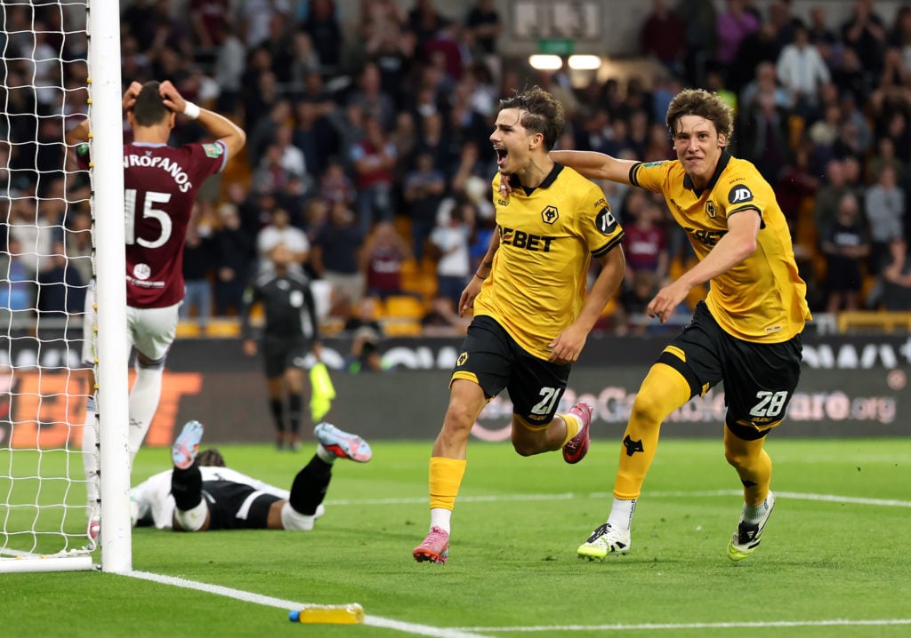 Rodrigo Gomes celebrates after scoring for Wolves.