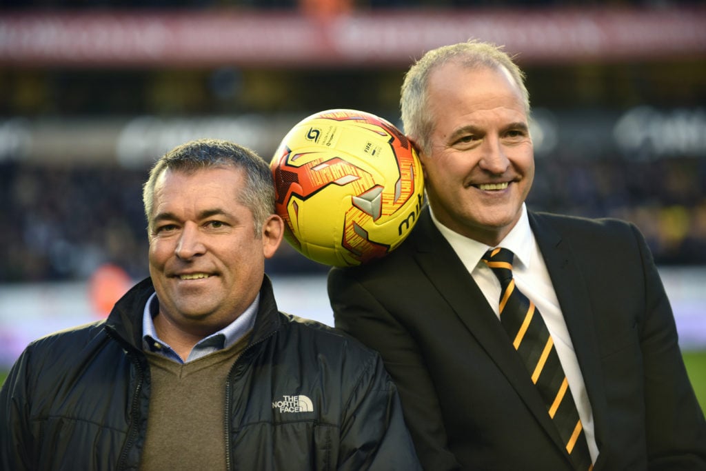 Steve Bull and Andy Thompson recreate their old Wolves image during the Sky Bet Championship match between Wolverhampton Wanderers and Sheffield Wednesday at Molineux on November 26, 2016 in Wolverhampton