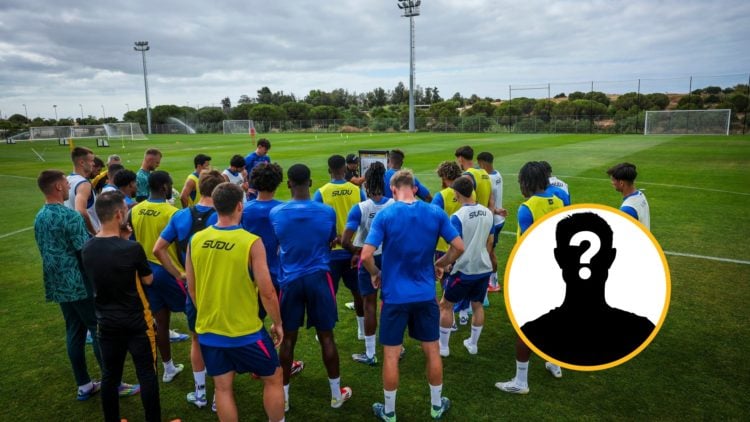 Wolves players stand and listen during pre-season training.