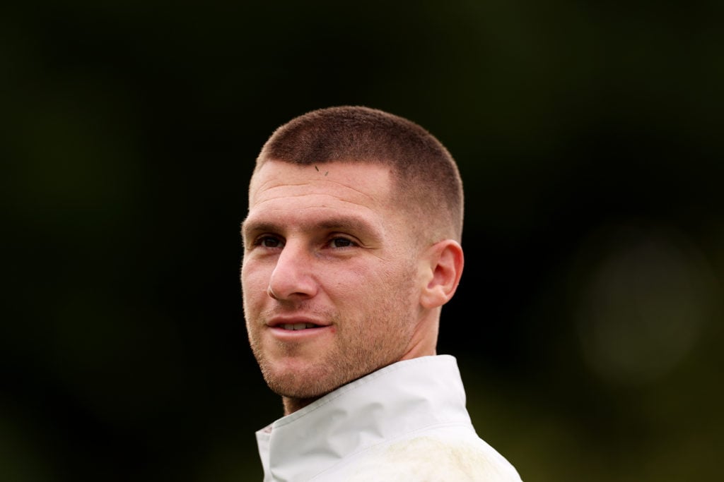 Sam Johnstone smiles in Wolves training.
