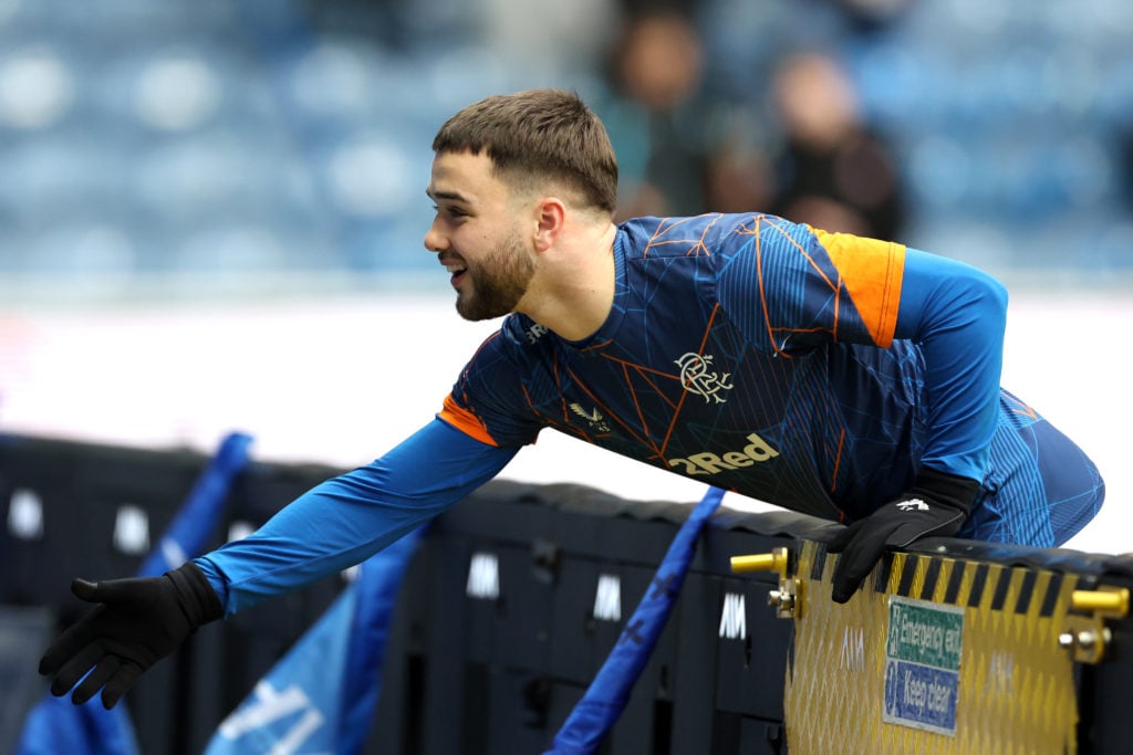 Rangers midfielder Nicolas Raskin extends his hand.