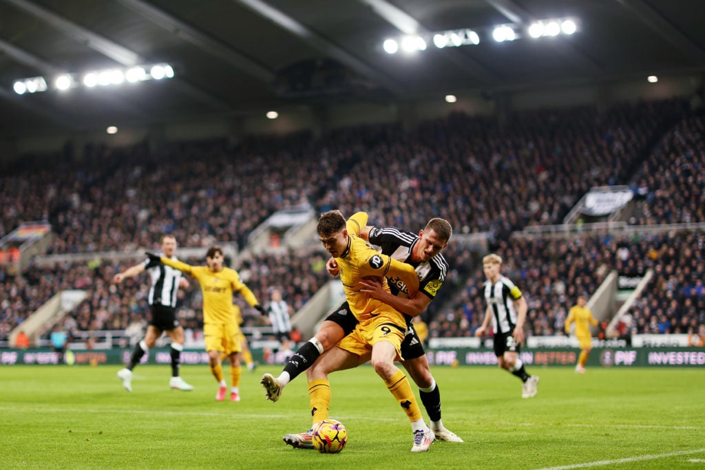 Wolves' Jorgen Strand Larsen battling against Newcastle defender