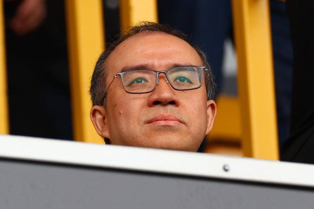 Jeff Shi looks on as Wolves play in the Premier League