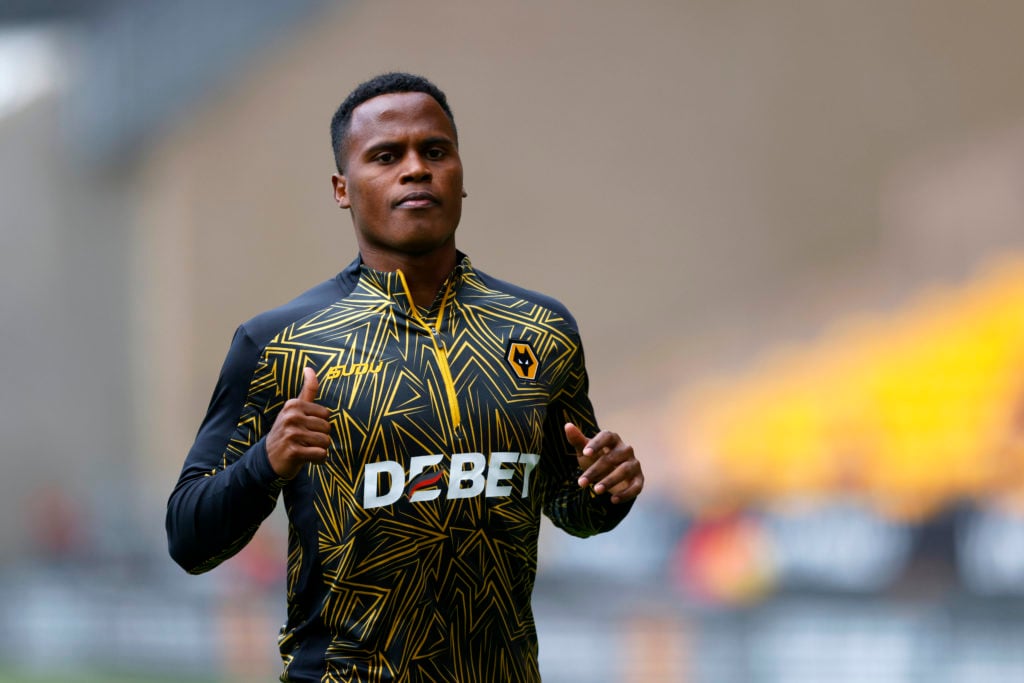 Jhon Arias warming up for Wolves.