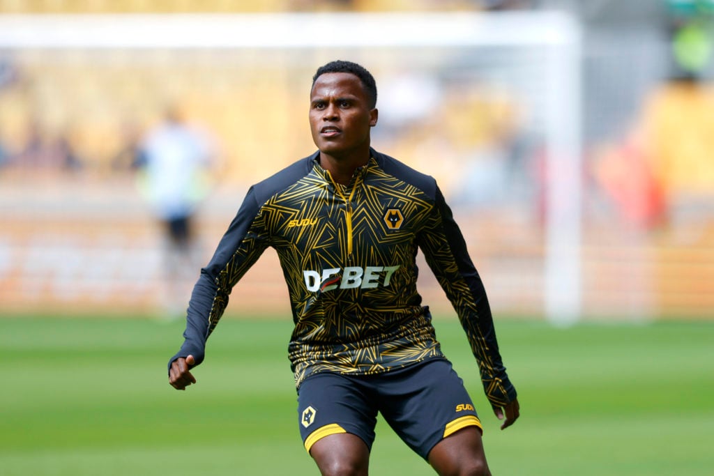Jhon Arias warming up for Wolves.