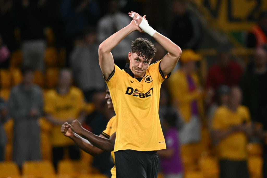 Jorgen Strand Larsen applauds Wolves fans at Molineux.